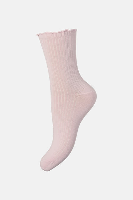Chaussettes roses de PIECES, avec une structure côtelée et un bord ondulé.