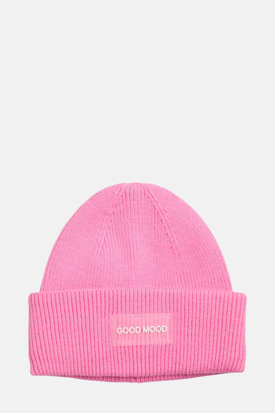Casquette rose de PIECES®, avec une texture rayée et l'inscription "GOOD MOOD" sur l'envers.