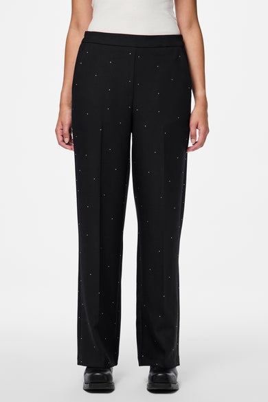 Pantalon noir de PIECES®, doté de points décoratifs et d'une ceinture élastique, vu de derrière.