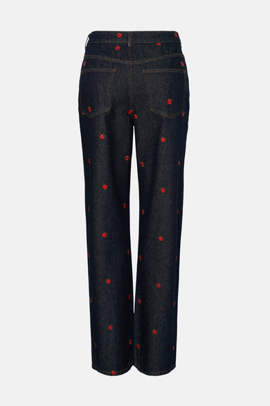 Jean droit bleu marine de PIECES® avec un motif de roses rouges brodé.