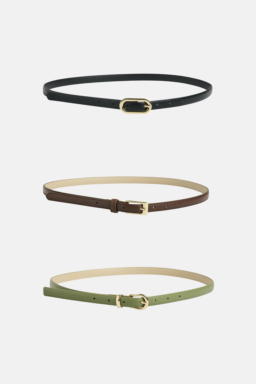 Ceintures multicolores de PIECES®, présentées en noir, marron et vert olive, avec des sangles fines et des boucles dorées.