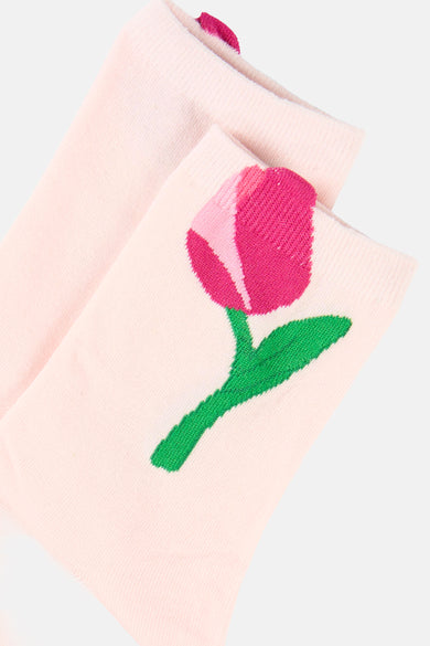 Roze sokken van PIECES® met een geborduurde roze tulp en groene steel.