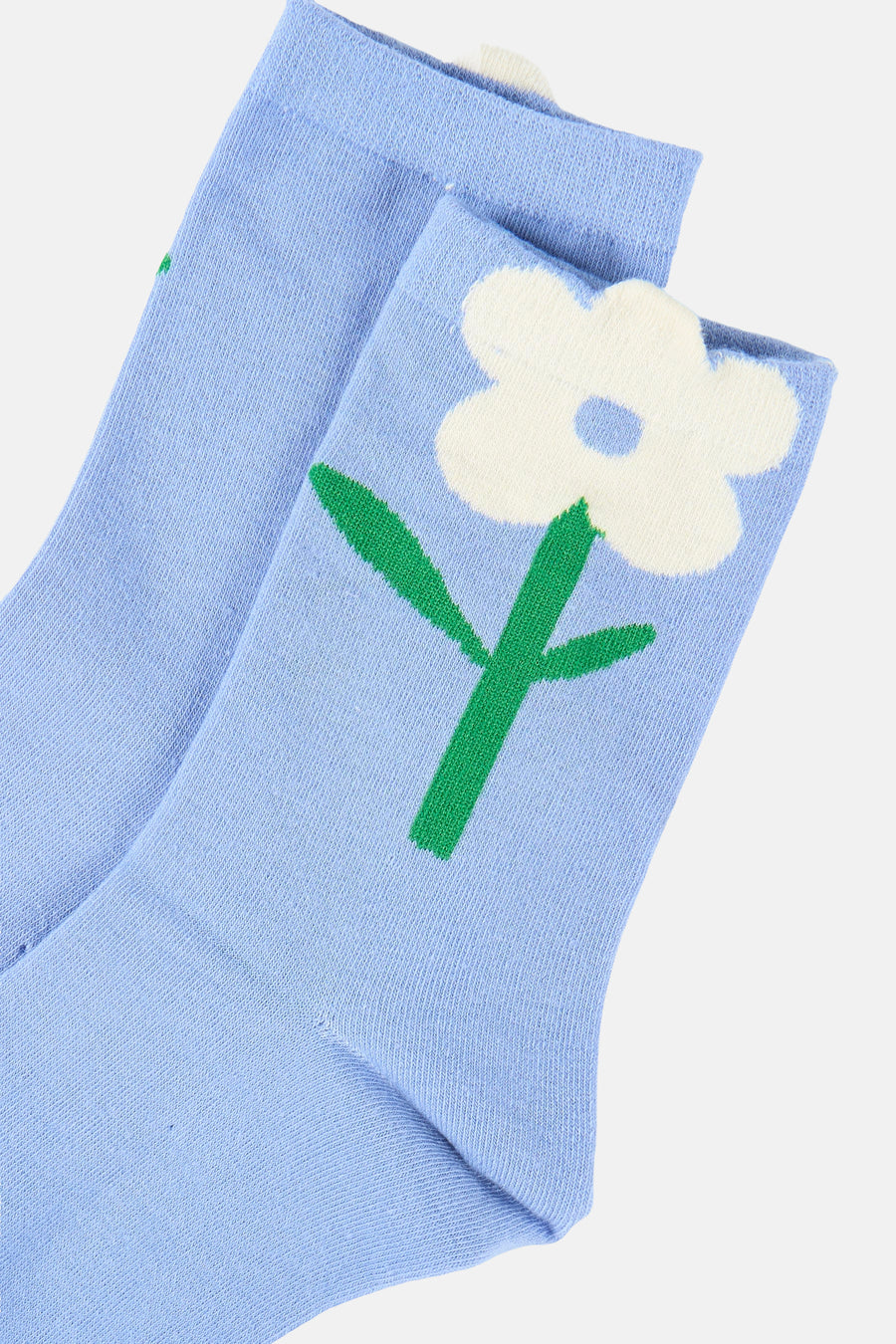Blauwe sokken van PIECES®, met witte bloem en groene stengel.