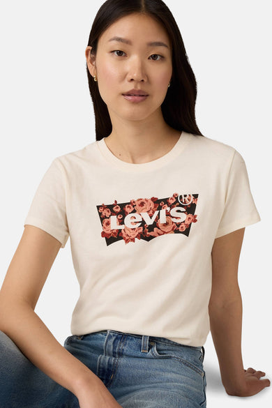 T-shirt beige à manches courtes de Levi's, avec imprimé floral graphique sur la poitrine.