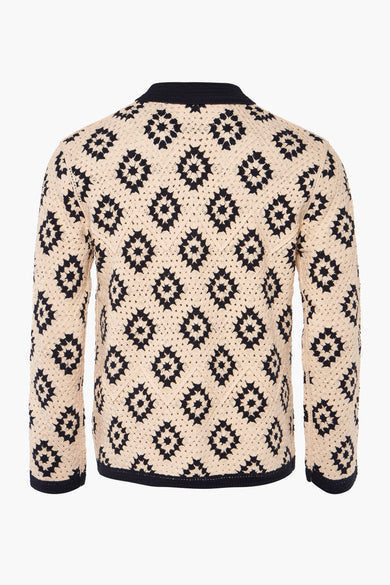 Gilet multicolore SCOTCH & SODA, avec un motif de broderie et une finition sombre sur les bords, vu de derrière.