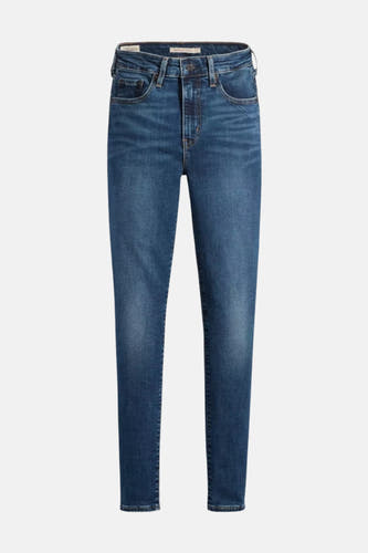 Jean skinny bleu marine de Levi's®, avec une légère usure.