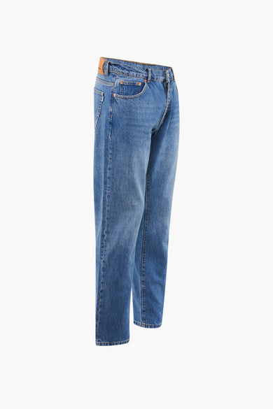 Jean tapered denim de WOODBIRD, en une lavage bleu clair.