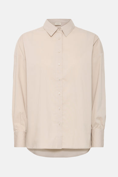 Chemise beige à manches longues de France, vue de derrière avec des plis sous le col.