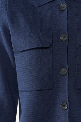 Gilet bleu de France, avec fermeture à boutons et poches brodées.