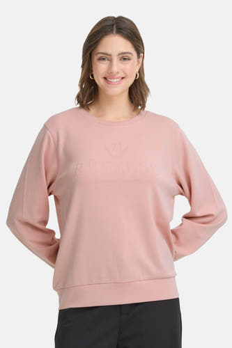 Gilets de rose en France, avec des manches longues et une subtile impression de texte sur la poitrine.