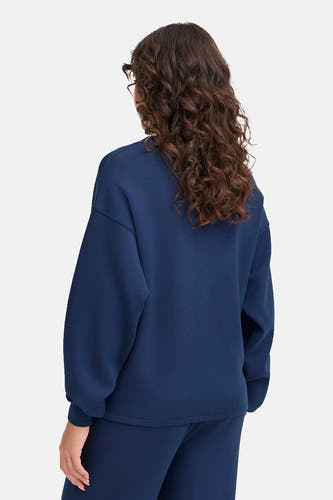 Blauwe sweater van Fransa, gezien van achteren met lange mouwen en een ronde hals.
