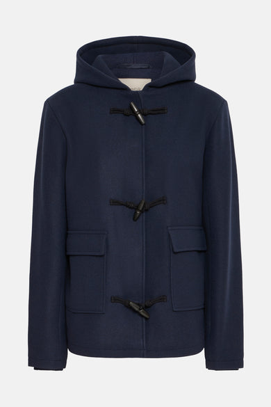 Manteau court bleu de France, avec capuche et fermeture à glissière noire sur l'avant.
