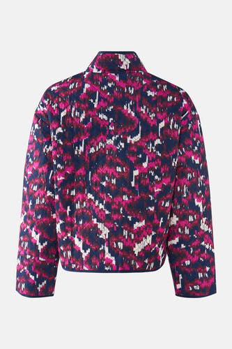 Manteau court multicolore de France, avec un motif géométrique et une texture doublée.