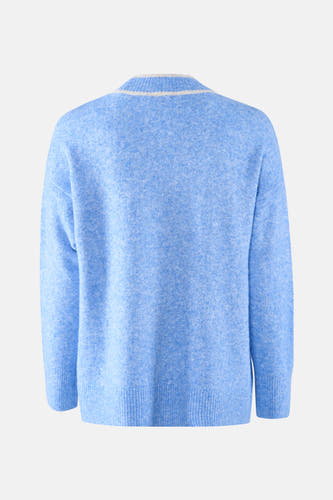 Veste bleue de France, avec des manches longues et une texture légèrement mélangée.