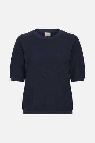 T-shirt bleu avec col rond en France, à manches courtes et fine structure côtelée.