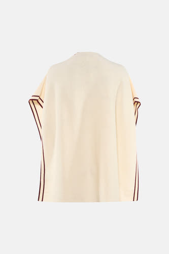 Gilet écru de Fransa, avec un passepoil rouge foncé sur le côté et les emmanchures, côté dos.