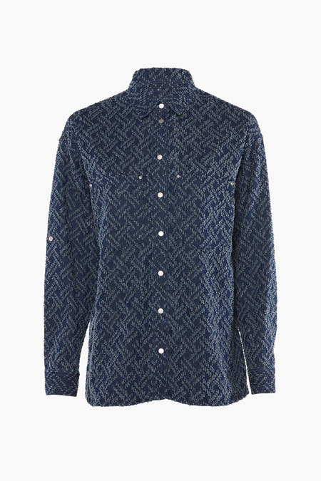 Chemise en denim à manches longues de Salsa Jeans, avec un motif tissé et des boutons blancs.
