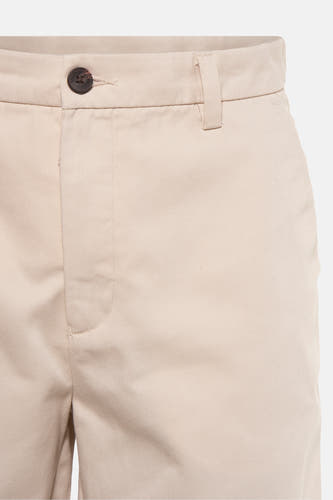 Crème court de SOLID avec un détail de nœud et une boucle d'arc.