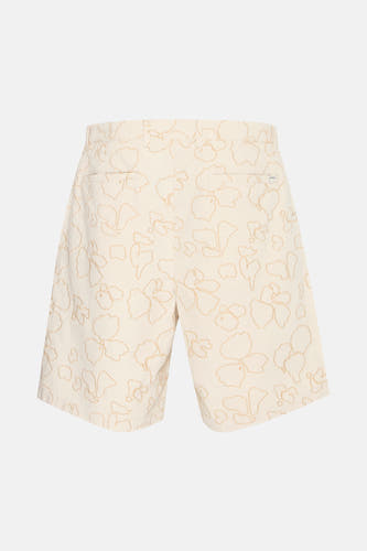 Beige court de SOLID, avec un motif de contours de fleurs.
