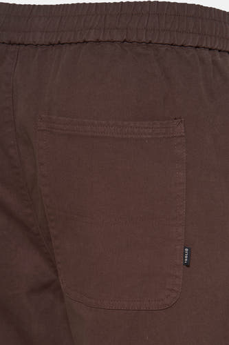 Pantalon brun de SOLID, avec une ceinture élastique et une poche arrière broiquée avec un petit étiquette de marque.