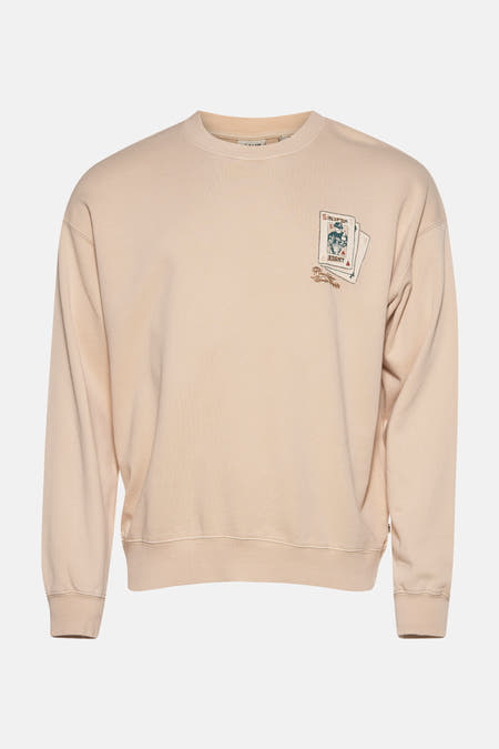 Gilet écru de SOLID, avec une impression de cartes à jouer sur l'avant.