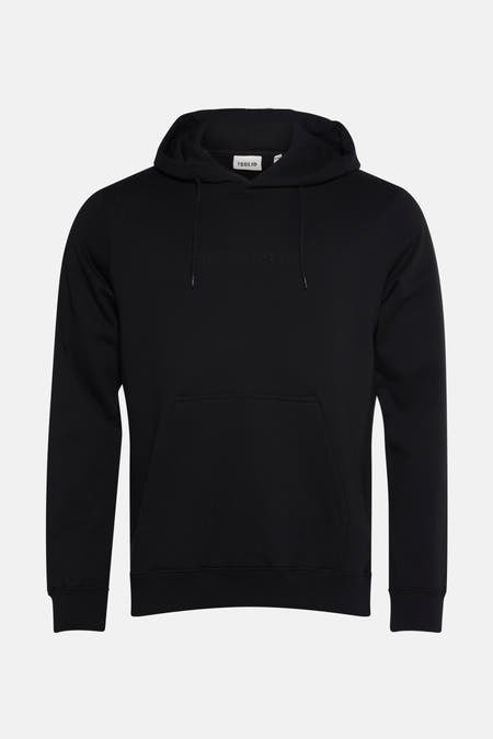 Gilet noir avec capuche SOLID, manches longues et poche à l'avant.
