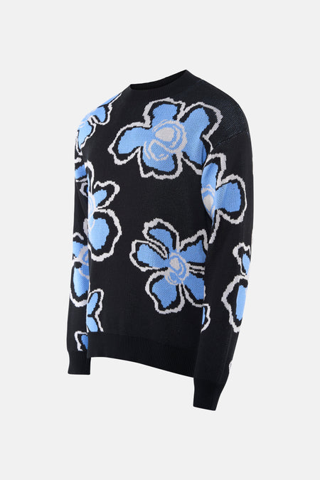 Gilet noir avec col rond de SOLID, à motifs de fleurs bleues et blanches.
