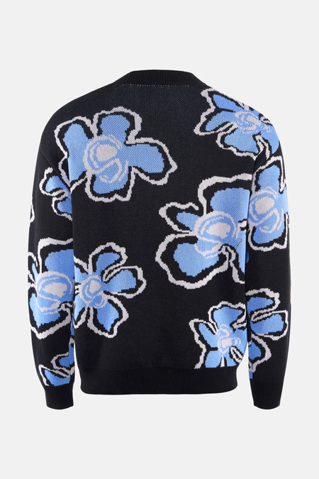 Gilet noir à col rond de SOLID, avec imprimé de fleurs bleues et contours blancs.