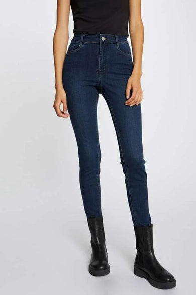 Jean skinny en denim bleu marine de Morgan De Toi, rehaussé de boutons dorés et d'une silhouette ajustée.