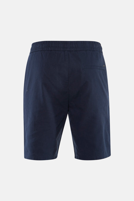 Blauwe short van ONLY & SONS® met elastische tailleband en achterzak, van achteren gezien.