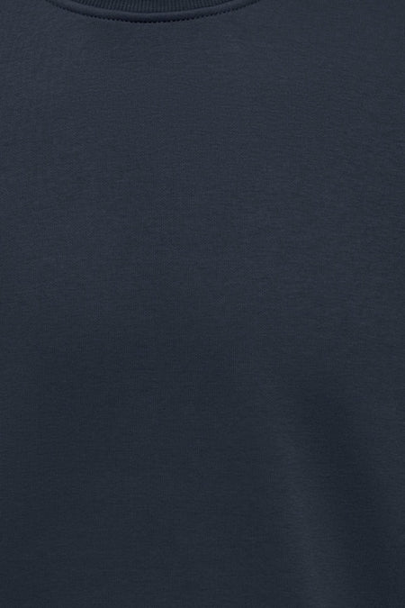 Donkerblauw sweatshirtstof met fijne ribbels.