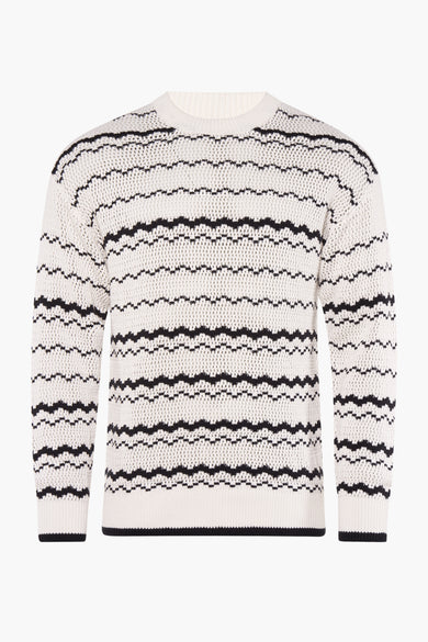 Pull blanc à col rond d'ONLY & SONS, avec un motif noir ondulé et une texture tr trée.