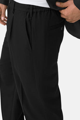 Pantalon noir d'ONLY & SONS, avec plis, poche à bouton et poche passepoilée avec bouton.