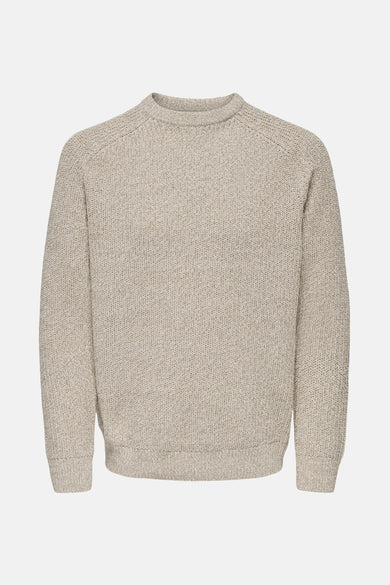 Beige gebreide trui.