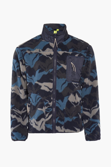 Fausse fourrure bleue de THEJOGGCONCEPT, avec un motif camouflage, des manches longues et une poche poitrine à fermeture éclair.