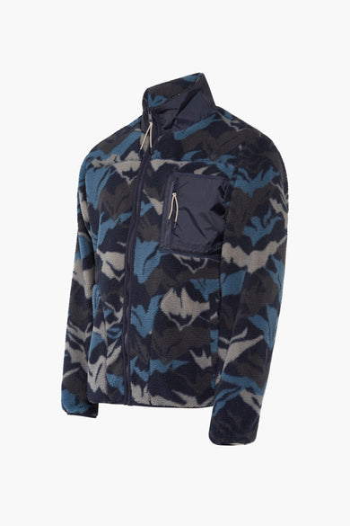 Veste en fausse fourrure bleue de THEJOGGCONCEPT, avec un motif camouflage et une poche poitrine à fermeture éclair.