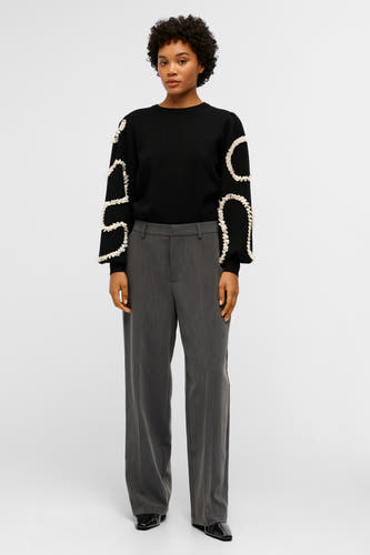 Pantalon gris de costume d'OBJECT, avec des pinces larges et un aspect formel.
