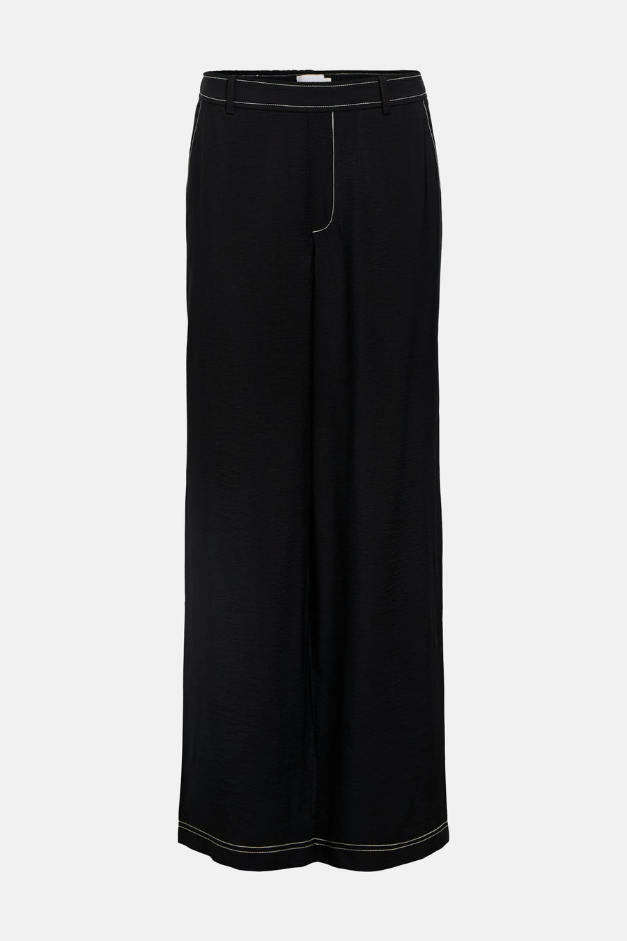 Pantalon noir d'OBJECT avec surpiqûres blanches le long des côtés et de l'ourlet.