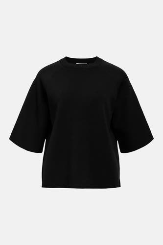 Pull noir de OBJECT, avec des manches courtes et amples et une texture en maille fine.
