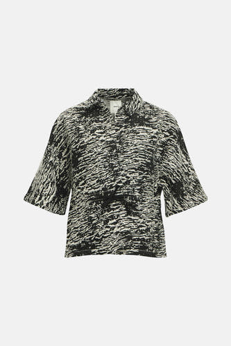 Gilet noir d'OBJECT avec un motif abstrait ondulé et des manches courtes.
