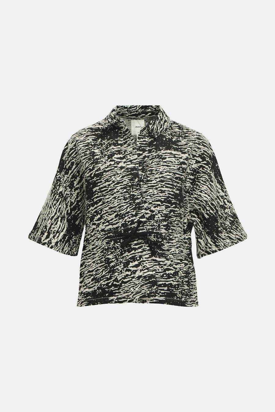 Gilet noir d'OBJECT avec un motif abstrait ondulé et des manches courtes.