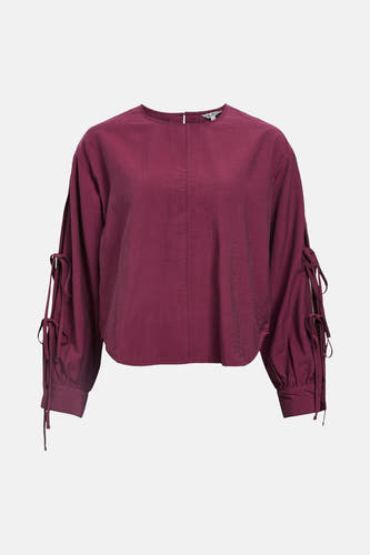 Blouse Bordeaux avec longues manches d'OBJECT, avec des fentes et des détails en tricot sur les manches.