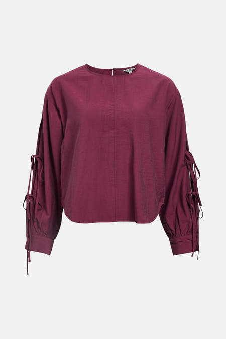 Blouse Bordeaux avec longues manches d'OBJECT, avec des fentes et des détails en tricot sur les manches.