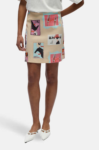 Jupe courte multicolore d'OBJECT, avec un collage de stickers illustrés.