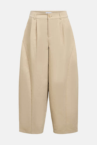 Pantalon beige de OBJECT, avec plis et jambes larges.