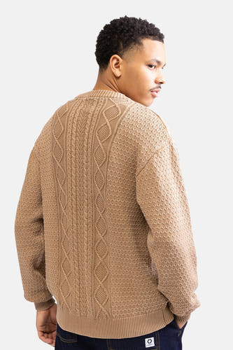 Gilet beige avec col rond de REDEFINED REBEL, avec un motif côtelé sur le dos.