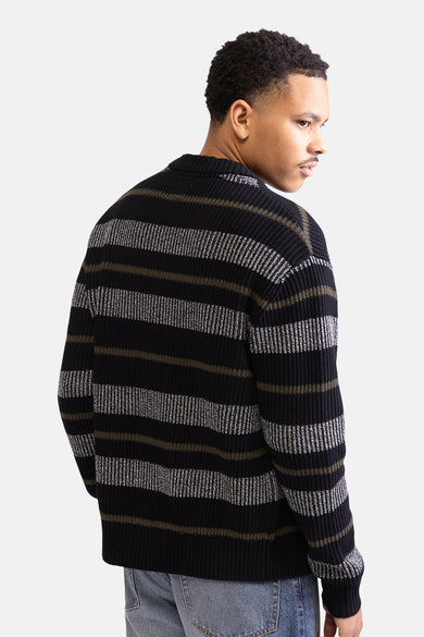 Gilet noir de REDEFINED REBEL avec des rayures de différentes couleurs, vue arrière.