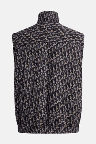 Gilet multicolore REDEFINED REBEL, avec un motif et un col haut, vu de derrière.