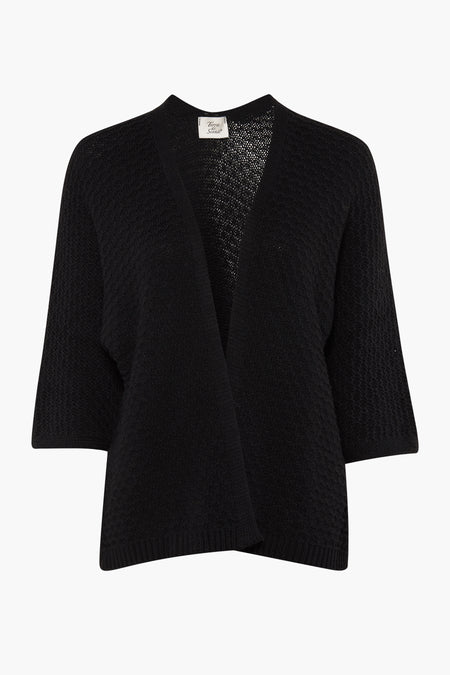 Cardigan noir de Terra di Siena avec des manches courtes et une texture tricotée.