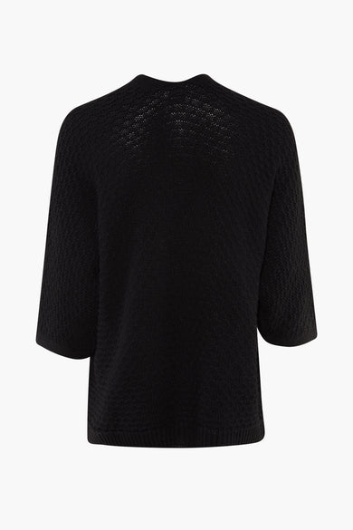 Cardigan noir de Terra di Siena, avec une texture fine tricotée et des manches courtes, vu de derrière.